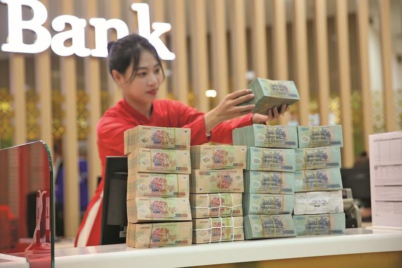 chinh-sach-tien-te-them-noi-long-ap-luc-voi-ty-gia-cang-tang