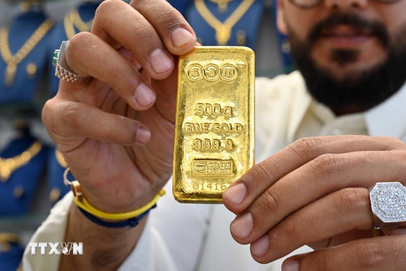 Giá vàng và bạc hạ nhiệt khi đồng USD mạnh lên